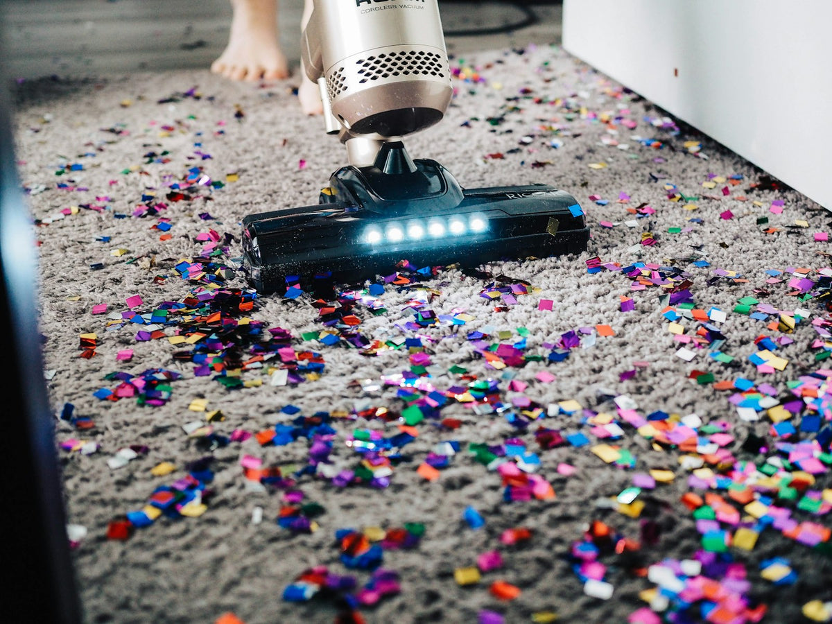 Vacuum cleaning a carpet